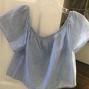 Light blue off the shoulder Black Swan top